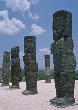 Warrior statues loom over visitors at Tula's Pyramid of the Morning Star. [Photo: Gordon Galbraith / Shutterstock]