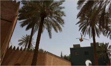 An Iraqi helicopter hovering over the Ishtar Gate in May. Groundwater and excavations have eaten away brick reliefs at its base. 