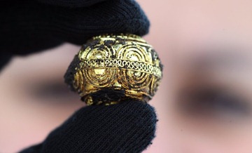 The treasure includes this intricately decorated pearl. The contents of the tomb are unusually well preserved. The find is a "milestone for the reconstruction of the social history of the Celts," said archeologist Dirk Krausse, in charge of the dig.