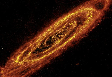 The orangey-red rings are cooler dusty regions where new stars are being born and which Europe's heat-seeking telescope Herschel observed through its infrared eyes Photo: ESA