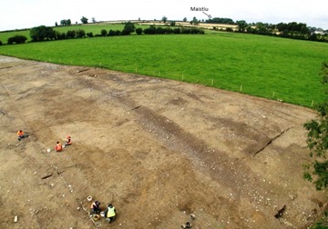 Excavation at the deserted village at Mullamast, overlooked by the ‘Royal Site’ of Maistiu.