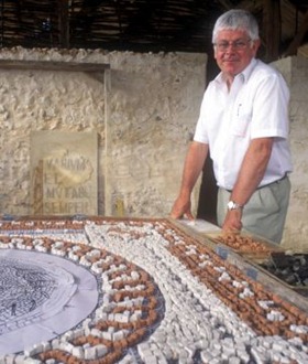 Dai Morgan Evans (right), who designed the villa for Rome Wasn't Built in a Day, in familiar territory with a giant Roman style mosaic
