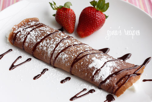 Satisfy your chocolate craving with these delicious, easy to make crepes filled with strawberries and cream. The perfect Valentine's Day breakfast or dessert! You can make the batter ahead of time and refrigerate what you don't use.