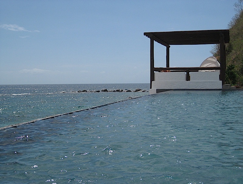 the infinity pool of Bellarocca Island Resort
