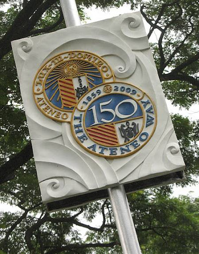 lamp post decoration of the Ateneo de Manila University with the Sesquicentennial tandem seals