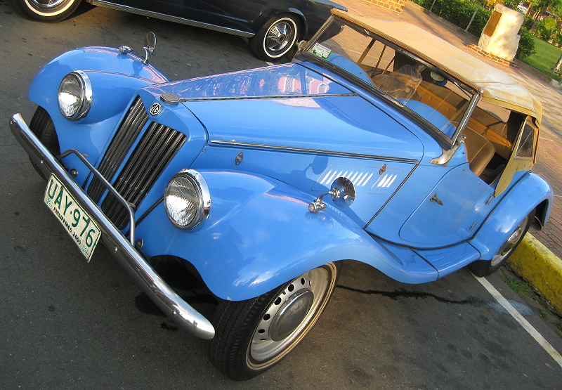 light blue convertible MG