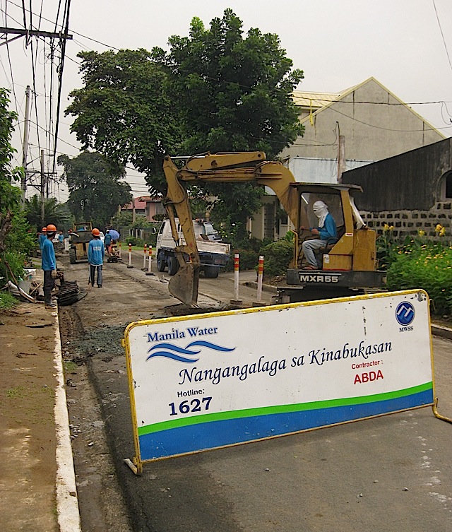 Manila Water digging a road for a sewer