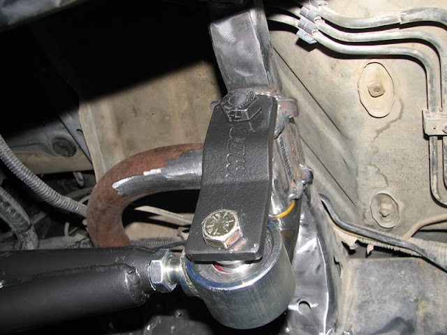 Barra de tração anti axle wrap