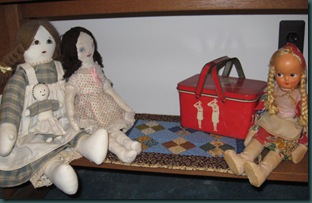 dolls and quilt