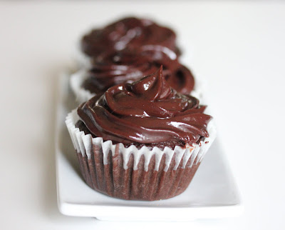 close-up photo of one chocolate ganache cupcake