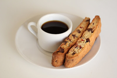 photo of Cranberry chocolate chip biscotti with a cup of coffee