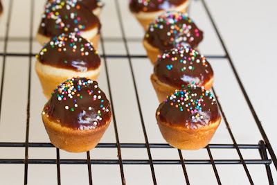 close-up photo of mini doughnut muffins on a baking rack