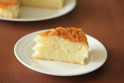 photo of a slice of Hot Milk Sponge Cake on a plate