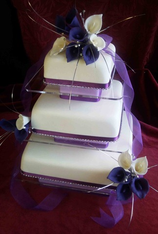 [3-tier-on-perspex-with-purple-calla-lillies[2].jpg]