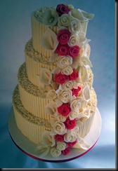 4 tier Chclate curls and Red roses