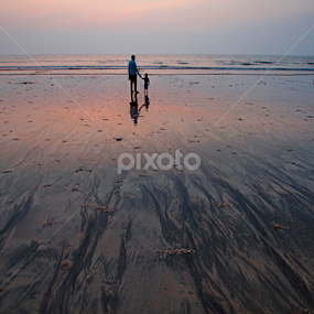 Banter, bonding on the beach. by Shikhar Sharma - Landscapes Sunsets & Sunrises