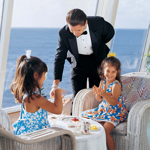 Junior-Cruisers-Kids-Tea-Time-in-Palm-Court-on-Crystal-Serenity - Kids get a giggle out of being served tea in the Palm Court on Crystal Serenity.