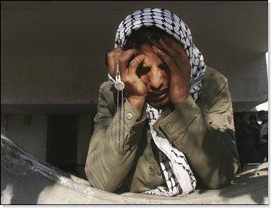 img_b1ed8caee5_woman_crying_in_gaza_ap