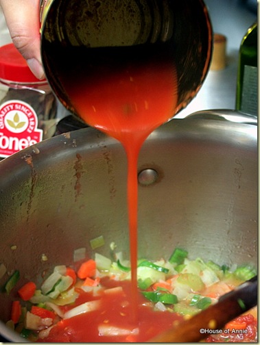  Adding Crushed Tomatoes to Cioppino Broth