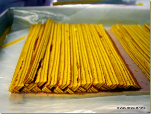 yellow triangular strips for sarawak layer cake design - copyright house of annie