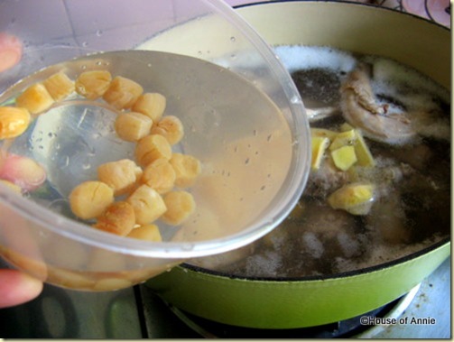 adding scallops to winter melon soup