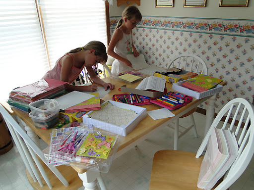 Each girl did several scrapbook pages designing them and decorating 