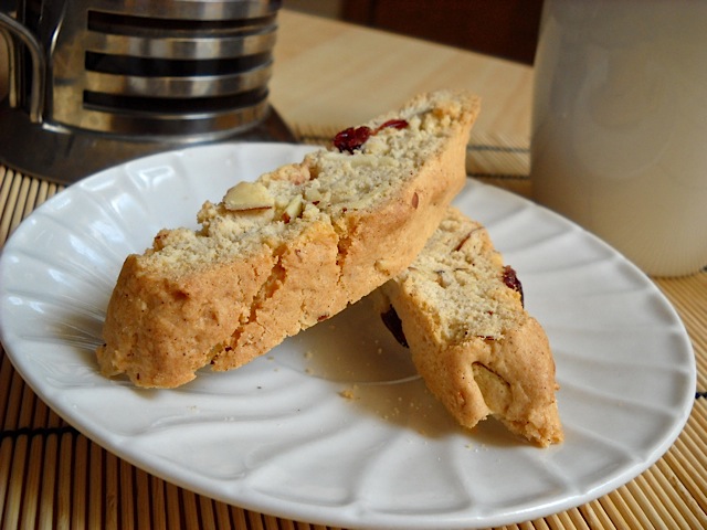 Two Cranberry Almond Biscotti placed on white plate 