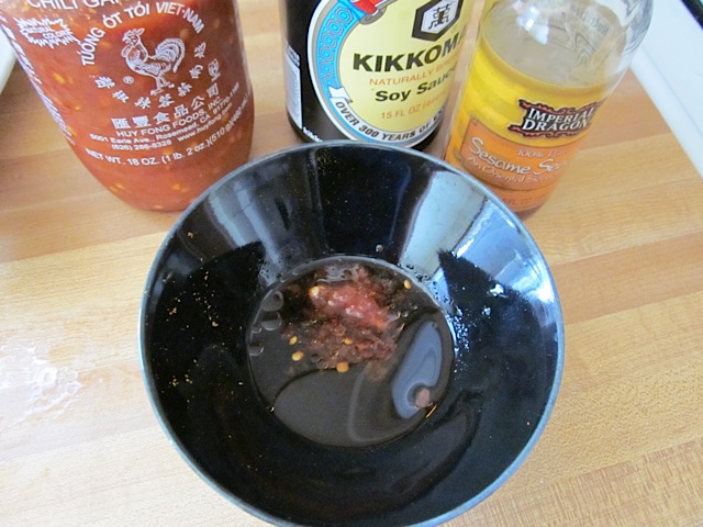 soy sauce, chili garlic sauce and sesame oil in bowl 