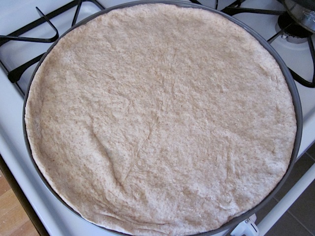 pizza dough on pan