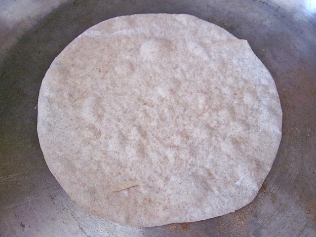 Cooking tortilla in skillet 