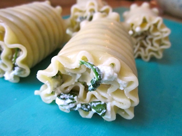 Lasagna noodles with filling rolled up into rolls 