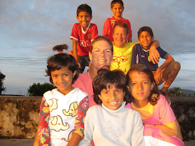 Marc Osborn and his friend Brooke Wilson with their six Nepali children.