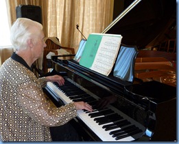 Dorothy Waddel playing the grand piano