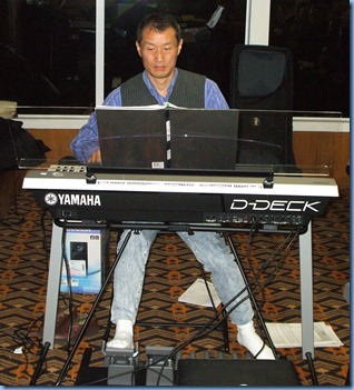 Takashi Iida (Taka) playing his magnificent Yamaha Electone D-Deck. Taka played 8 pieces as diverse as Elgar to the Beatles. Wonderful stuff! Music was flying everywhere as he finished each group of pages!