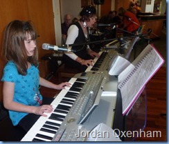 Jordan Oxenham, a student of Carole Littlejohn, played two pieces on the piano and then one piece on the Tyros keyboard accompanied by Carole Littlejohn on a Korg Pa1X keyboard