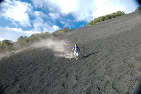 running down the side of volcan pacaya guatemala 
