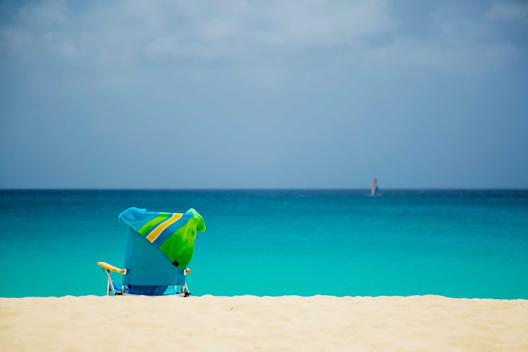 Imagine yourself here: in a chair facing the warm tropical waters of Anguilla.