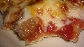 close up view of thin crust pizza