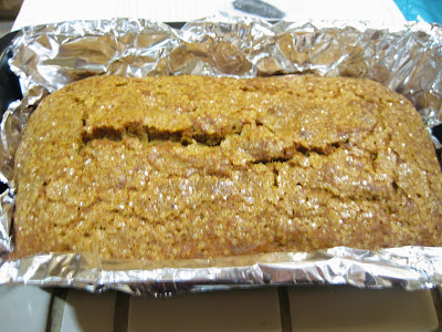 overhead photo of a loaf of Pumpkin Tea Cake in a pan