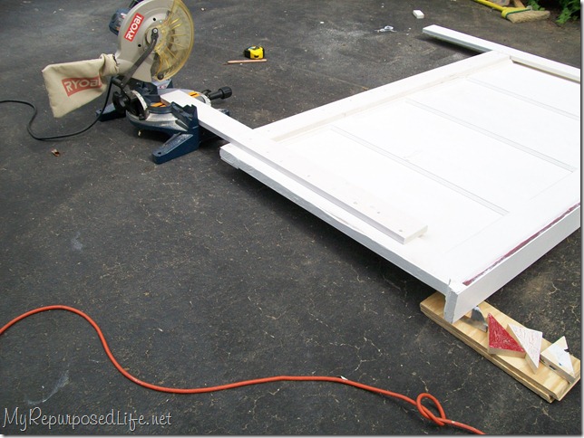headboard made from an old door - adding legs modified old door headboard