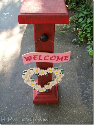 small porch post with welcome sign