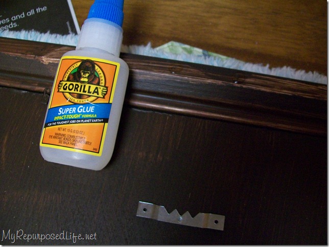 use gorilla super glue to add a saw tooth hanger