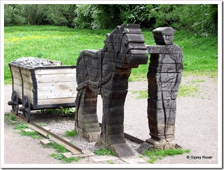 Sculpture to the tramway which ran from Brecon basin back into the mountains, carrying coal out and timber in.