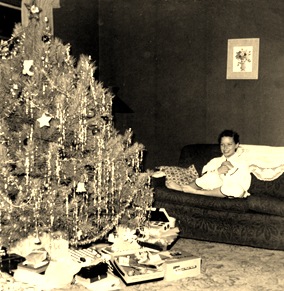 Karen Christmas on sofa 1956