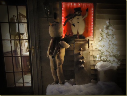 Snowman at back door NIGHT