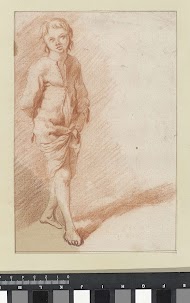 Staande jongen op blote voeten