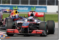 Jenson Button (GBR) McLaren MP4/25 leads Mark Webber (AUS) Red Bull Racing RB6.
Formula One World Championship, Rd 8, Canadian Grand Prix, Race, Montreal, Canada, Sunday 13 June 2010.
