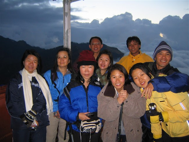 behind us is top of the world bur covered by cloud