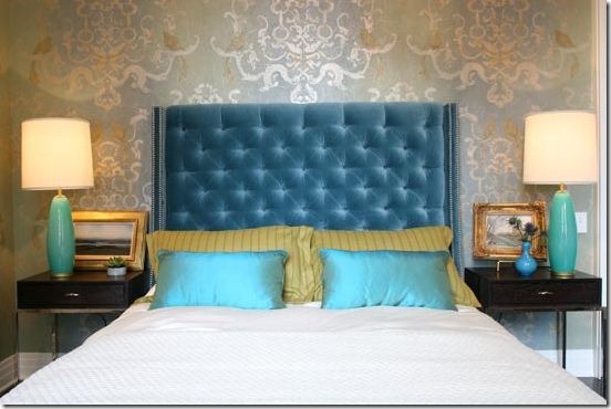 bedroom designed by summer thornton, with tufted turquoise headboard