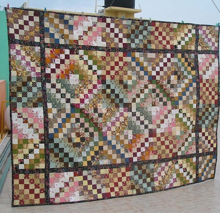 [Many Scrappy Trips Quilt Top 30 April 2010[6].jpg]